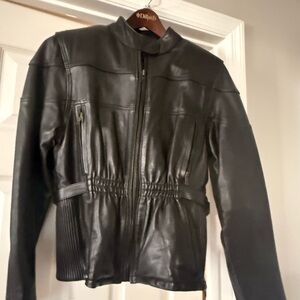 Women’s black leather biker jacket
Wore twice
